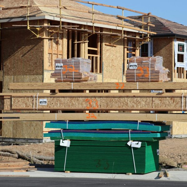 Wood frames and materials at a construction site for new homes in Elk Grove, California.